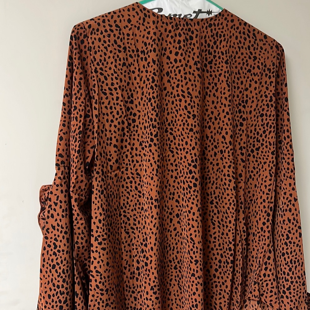 Gorgeous animal print blouse with bell sleeves
